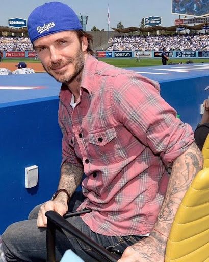 David Beckham vestiti capelli gucci look rosa pink vip foto