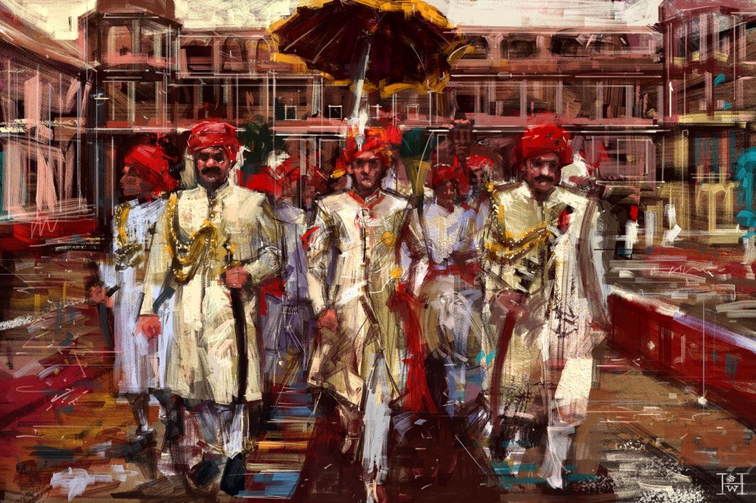 Uomini indiani con la giacca sherwani e i pantaloni jodhpur.